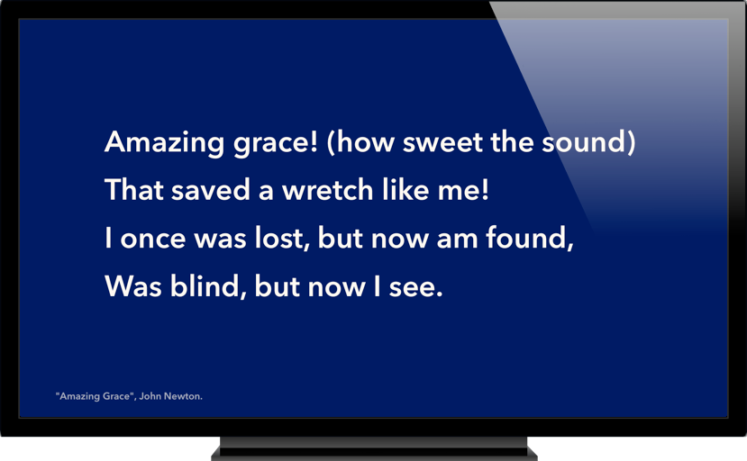 External TV showing Presentation theme lyrics, large white text on a dark blue background