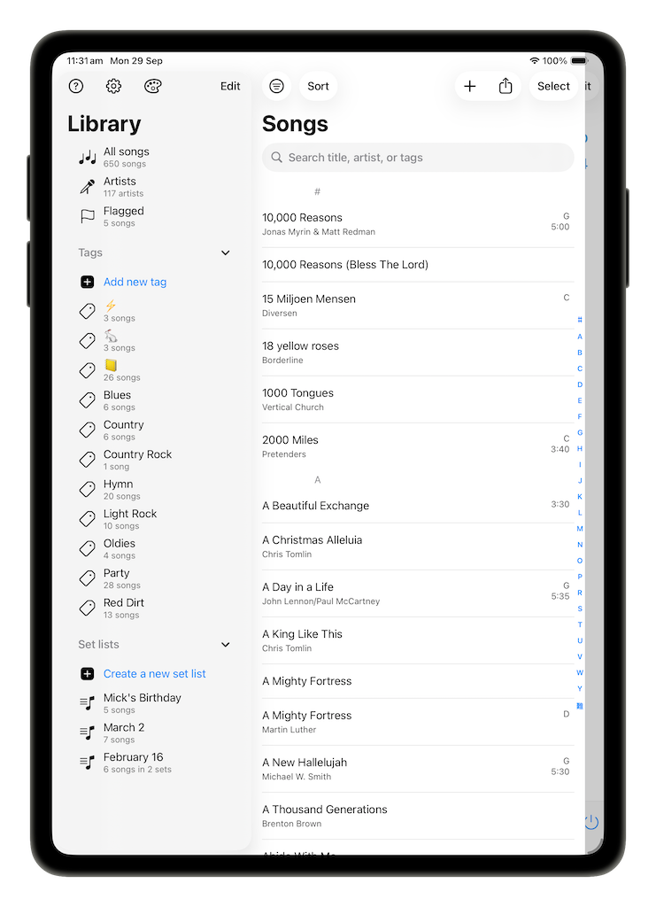 Library view on iPad with the sidebar of tags and setlists beside the song list